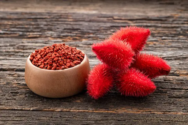 stock image Annatto Plant - Organic Bixa Orellana seeds. wooden background