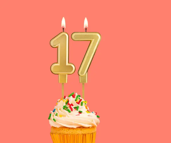 stock image Birthday number 17 - Golden candle with cupcake