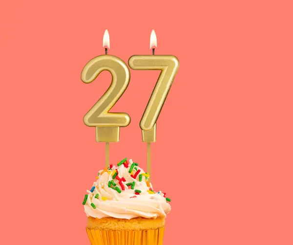 stock image Birthday number 27 - Golden candle with cupcake