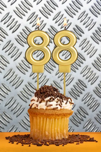 stock image Birthday candle number 88 - Industrial metallic background.