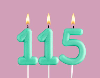 Birthday card with green number 115 candle - Pastel pink background clipart