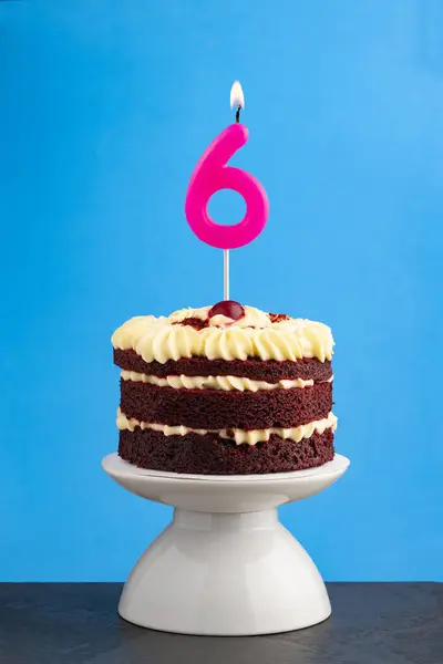 stock image Red velvet birthday cake with number 6 candle