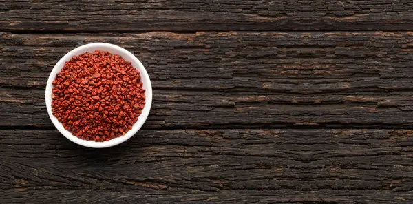 stock image Bixa Orellana - Organic red annatto seeds in the bowl