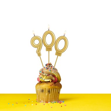 Birthday candle number 900 - Cupcake on white background