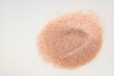 Pink Himalayan sea salt fine grain and crystals. clipart