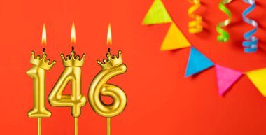 146 numaralı mum - Turuncu arka planda flama ile doğum günü kutlaması