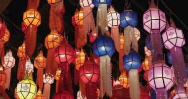 Colorful paper lanterns Lanna style during Loy Krathong festival in Chiang Mai Province, Thailand. 4K