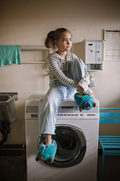 Eco Conscious Teenage Girl Waits Common Laundry Sustainability Responsible Living — стоковое фото