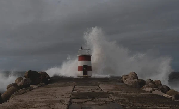 lighthouse on the Atlantic ocean coast in a storm