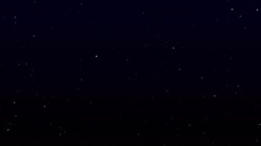 Kayan yıldızların bilgisayar grafikleri. Karanlık arka planda parlayan yıldızlar. 4K video kaydı. Yüksek kalite 4k görüntü