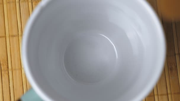 Granules Instant Coffee Fall Bottom White Mug Making Coffee Morning — Stockvideo