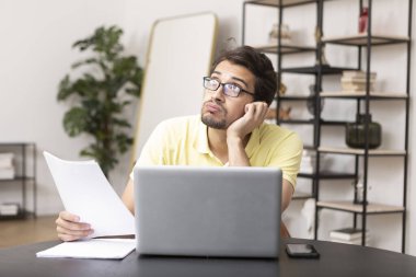 Young man disappointed after online courses. Unsatisfied of distance learning and stressful education concept