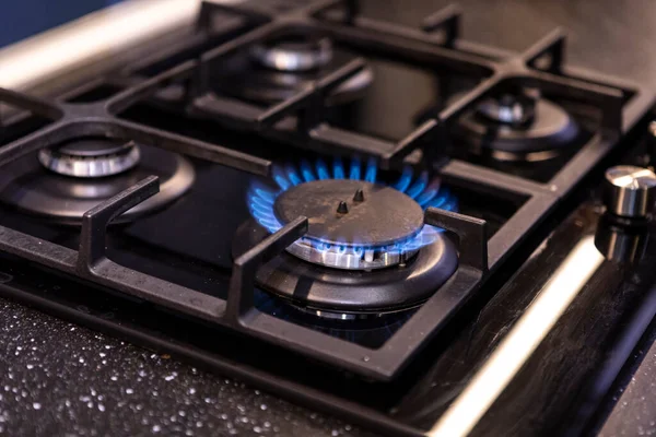 stock image Photo of working gas-stove with blue flame. Gas crisis and high prices concept