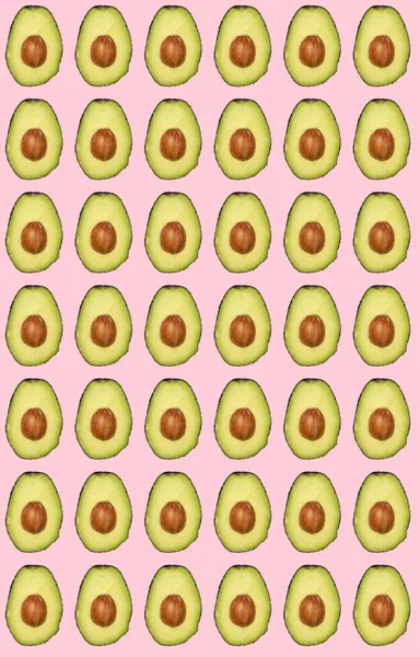 Nahtloses Muster Aus Halb Frischer Avocado Auf Rosa Hintergrund Hochwertiges — Stockfoto