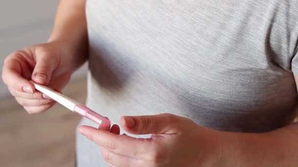 Close Top View Woman Holding Positive Pregnancy Test Waiting Result — Stock Video
