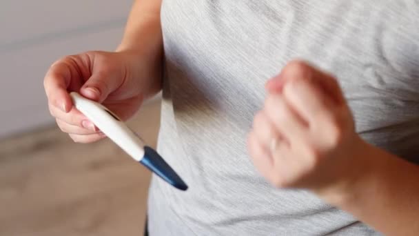 Close Pregnant Woman Holding Digital Positive Pregnancy Test Blurred Background — Stock Video