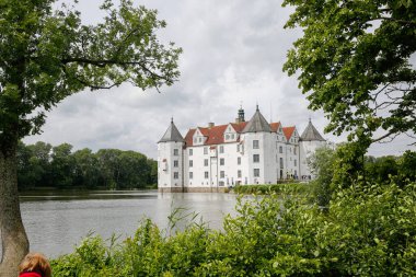  Flensburg, Germany - white big castle in Flensburg Gluecksburg city view in summer. clipart