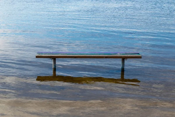 Wooden Bench Stands Water Day Close — Stock Photo, Image
