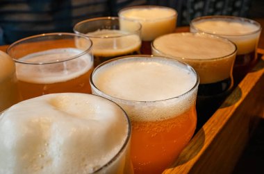 Assorted beer in glasses close-up. Beer set, selective focus