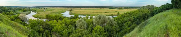 stock image Landscape panorama of the picturesque valley of the Seversky Donets river (Siverskyi Donets) with meadows and trees on a summer day