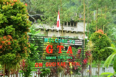 Tegal, Indonesia, October 26, 2024 : Signpost for a tourist attraction 