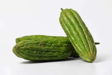 Endonezya sebze yemeklerinde sıklıkla kullanılan taze yeşil kavunları kapatın, temiz beyaz arka planda izole edilmiş..