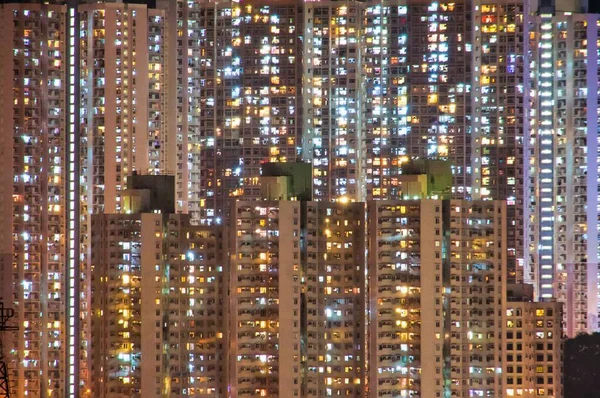 The view at night of the residential buildings in Hong Kong