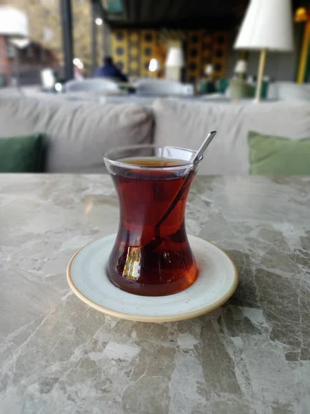 Black tea on the table. Traditional Turkish tea in the cafe.