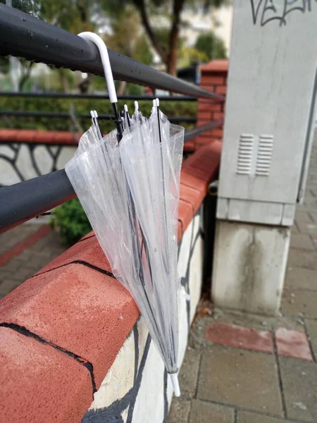 Umbrella Hangs Iron Fence — Stock Photo, Image