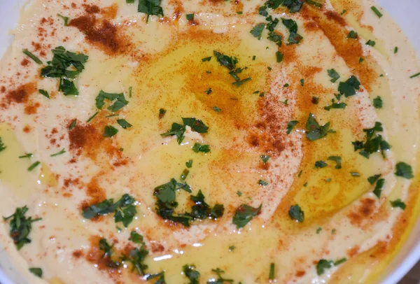 Hummus Textuur Achtergrond Hummus Plaat Extreem Close Met Olijfolie Paprika — Stockfoto