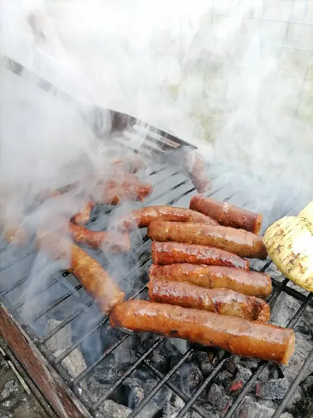 Man Turns Sausages Smoking Grill Fork Sausages Bbq Smoking High — Stock Photo, Image