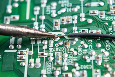 A hand throws pills into the toilet for flushing water