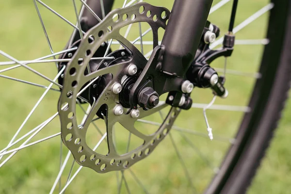 stock image Bicycle gears, disc brake and rear derailleur. The switches are on the steering wheel