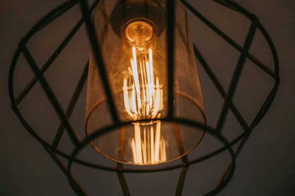 stock image Edison bulb replacement in the lamp