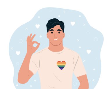 LGBTQ gökkuşağı ve transseksüel kalbi olan eşcinsel adam gururu ay ya da gün kutluyor.