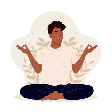 Genç adam meditasyon yaparken gözleri kapalı ve bacakları çaprazlanmış. Uluslararası Yoga Günü. Çocuk onun en sevdiği hobiyi yapıyor.