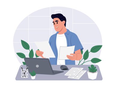 Genç adam internette çalışıyor, bir ofis masasında oturuyor..