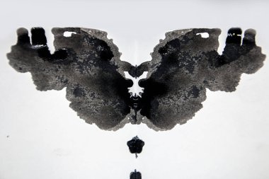 Black blot on a white background in the Rorschach test close-up