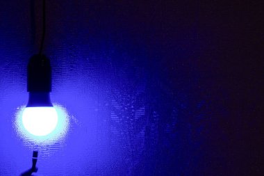 lamp on a blue background, abstract picture, light, blue light