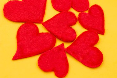 valentine's day heart made of hearts, red and yellow, isolated on white background.