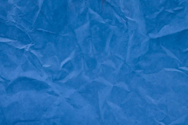 blue background, crumpled paper, blue paper