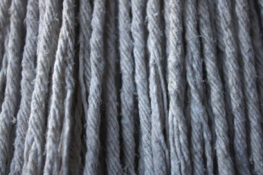 Bu, soyut beyaz iplik dokusu arkaplanının bir fotoğrafı.