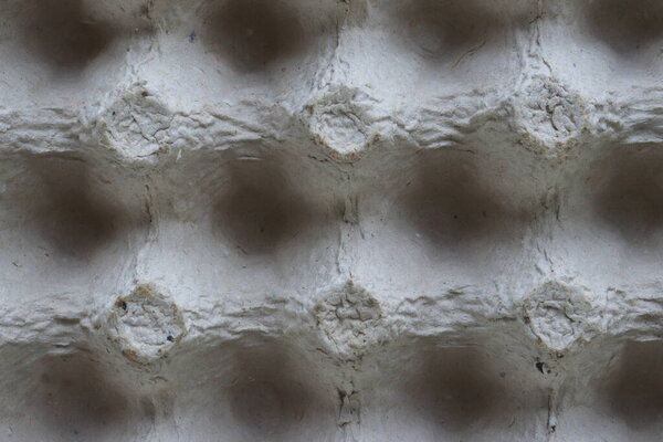 White volumetric texture egg rack white mesh background