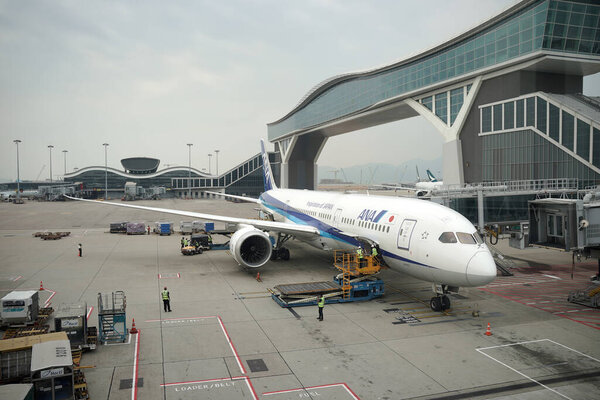 Hong Kong, China - October 4, 2024: All Nippon Airways or ANA Airlines aircraft prepare for departure at Hong Kong International Airport.