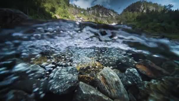 Shot Fast Flowing Shallow River Rocky Bottom Latefossen Waterfall Background — Stock Video