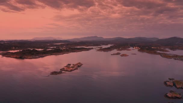 Pale Pink Sunset Skies Archipelago Slow Motion Pan Left High — Stockvideo