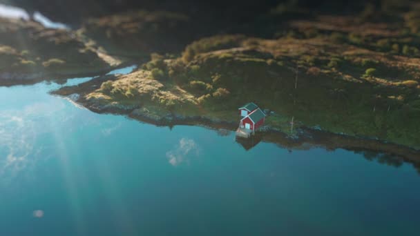 Small Red Cottage Boat House Fjord Shore Aerial View High — Stockvideo