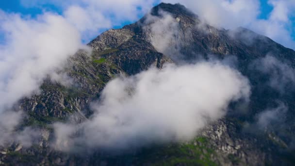Aerial View Thin Clouds Whirl Forest Covered Mountain Peaks High — Stockvideo