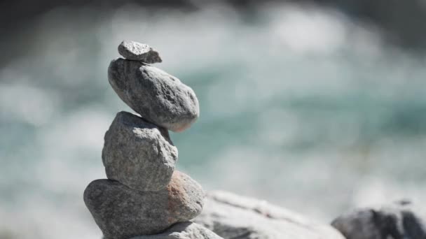 Small Stone Cairn Riverbank Blurry Background Loop Video High Quality — Vídeo de Stock