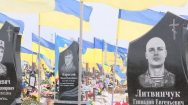 Kharkiv, Kharkiv Oblast, Ukraine. February 18, 2023, City Cemetery. Graves of Ukrainian soldiers in the Alley of Glory.